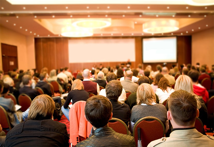 Photo of members at a meeting.