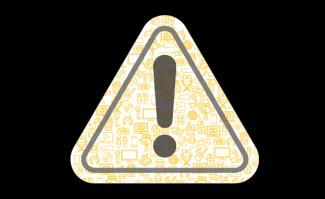 Yellow caution sign on a black background