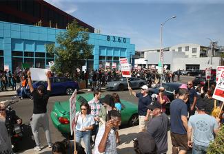 Members and allies line the street at BBH's office on Melrose in Los Angeles, CA