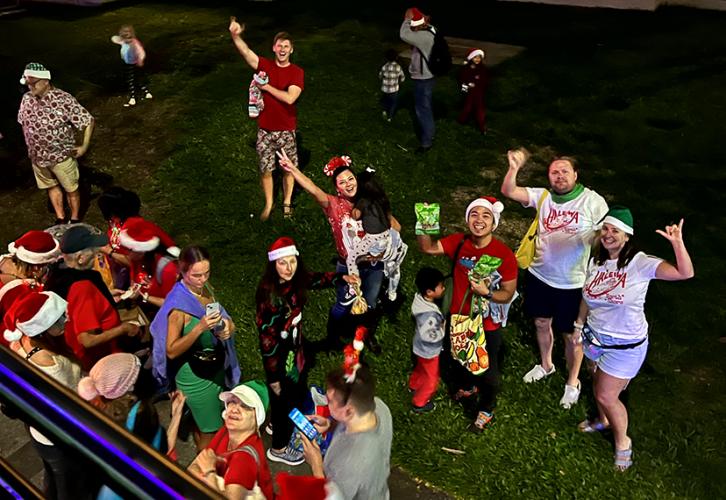 Members celebrate the season with song
