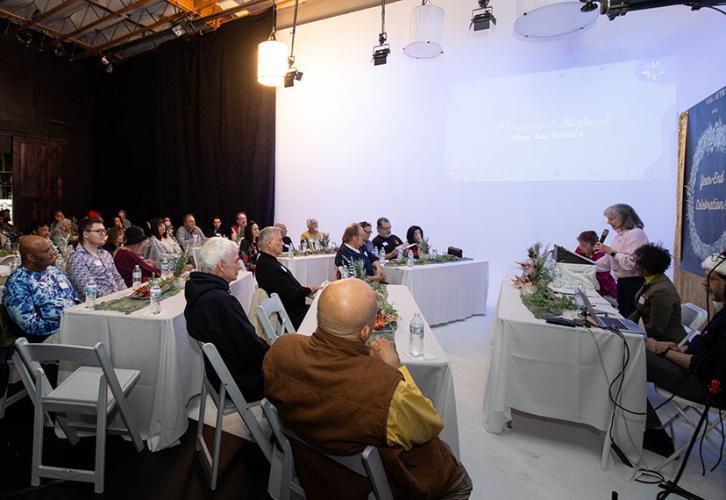 Members celebrate at the Dec. 3 membership meeting. 