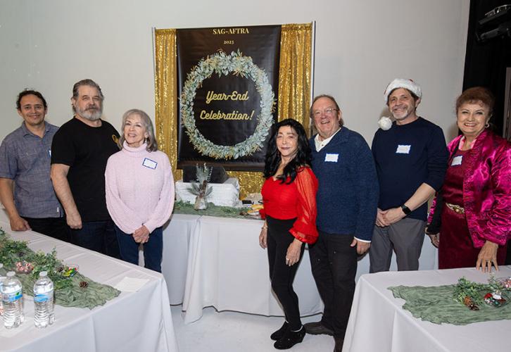 Members celebrate at the Dec. 3 membership meeting. 