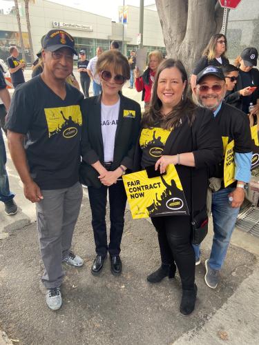 members standing together smiling