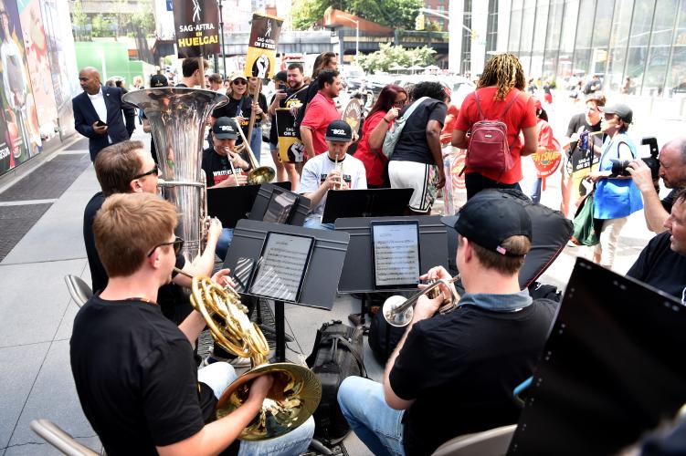 AFM Local 802 brass band plays for the crowd.