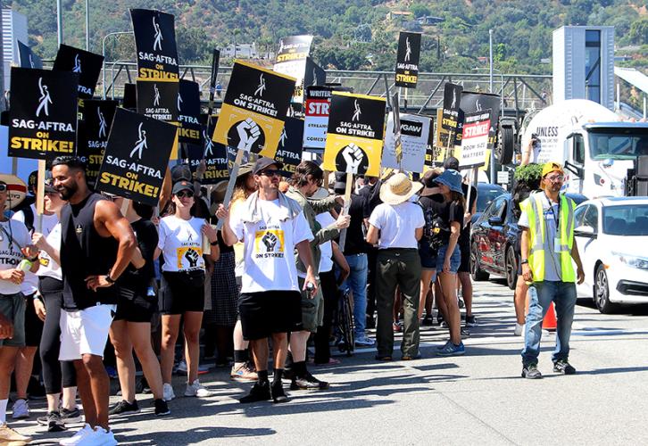SAG-AFTRA members and those in solidarity picket at NBCUniversal. Photo by Jack E. Herman. 
