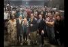 After participating in a low-budget contracts presentation, SAG-AFTRA business rep Tawanda L. Duck, UNLV Professor Adam Paul and Nevada Local President Kim Renee joined UNLV students and faculty and Nevada Local members for a group photo. A large group of diverse people stand for a group photo in a theater.